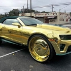  Gold-soaked King ZL1 Camaro rides on 30-inch gilded wheels with three 23-inch TVs