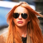  Lindsay Lohan Wears Thigh High Leather Jeans with her Harley Davidson T-shirt in New York
