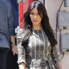  Kim Kardashian Sported Glossy Brown locks and Sultry Eye Make-up for the Outing