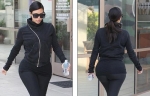 Kim Kardashian in black jacket and leggings