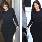  Kim Kardashian looks glum in clinging black