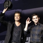 Brad Pitt wins waving his hat