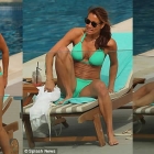 Melanie Sykes, 46, Flaunts Her Washboard Abs in a Skimpy Green Bikini