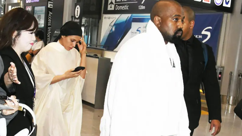  Bianca Censori and Kanye West Opt for Modest Attire on Arrival in Japan